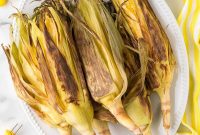 Blackstone Grilled Corn on the Cob in the Husk – Juicy BBQ Flavor