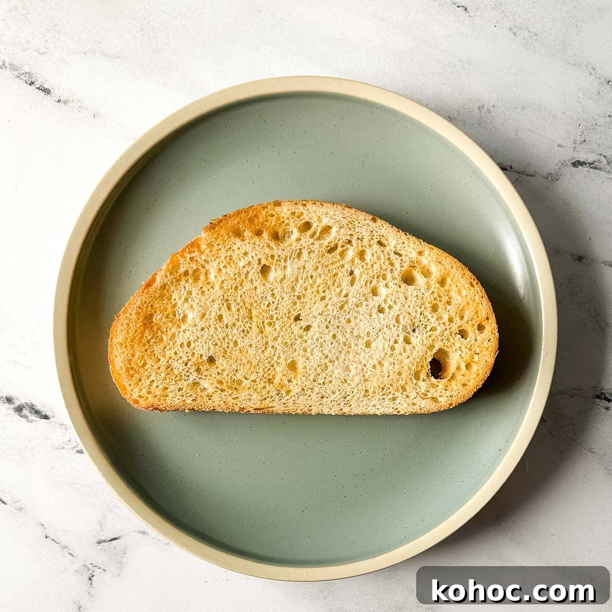 Creamy Avocado Lime Tartine Recipe for Fresh Breakfast 4 a piece of toast on a blue plate.