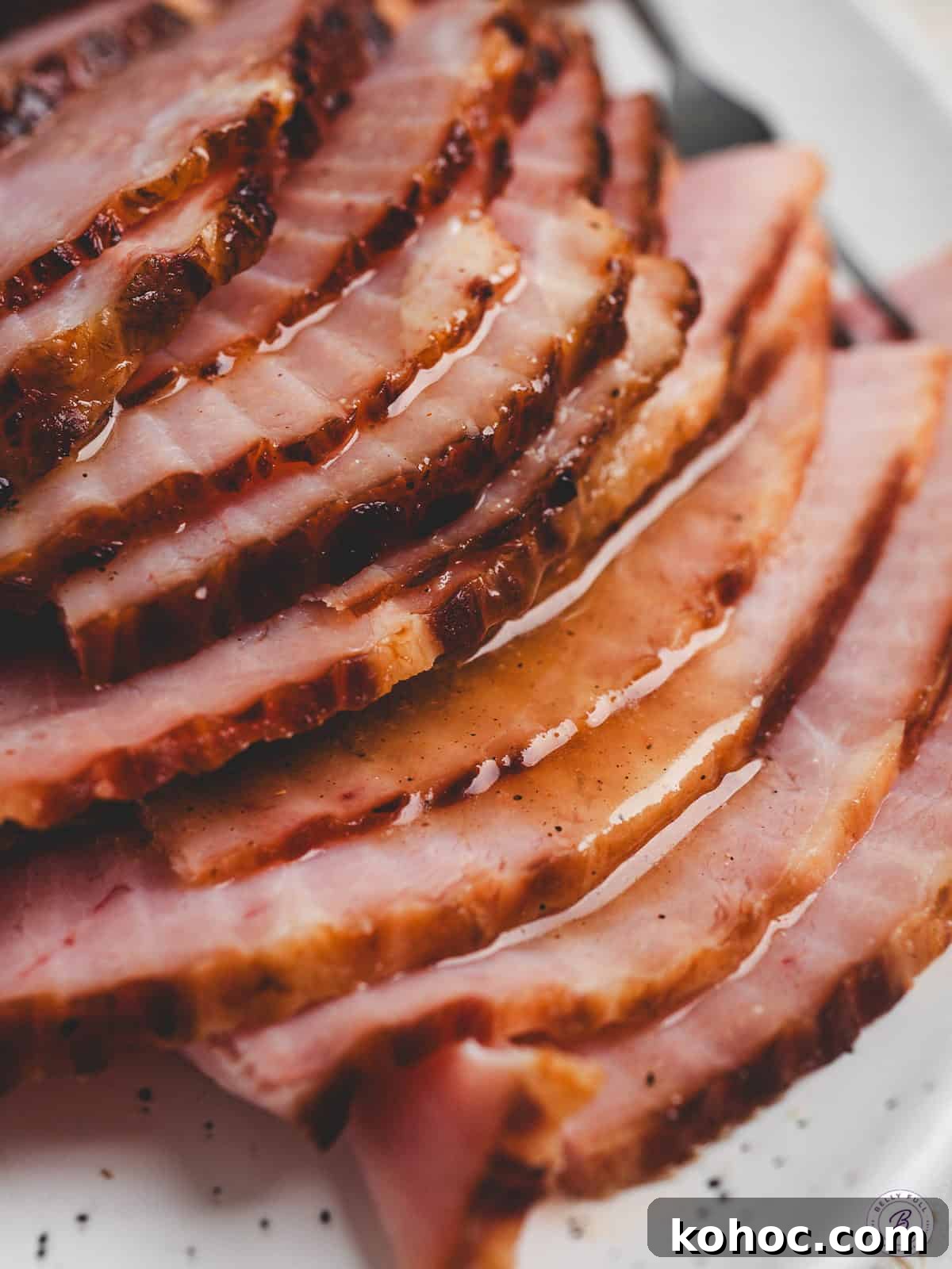 Sweet Pineapple Glaze for Ham: Tangy Ham Glaze Recipe 2 A baked ham covered in pineapple ham glaze.