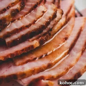 Sweet Pineapple Glaze for Ham: Tangy Ham Glaze Recipe 3 A baked ham covered in pineapple ham glaze.