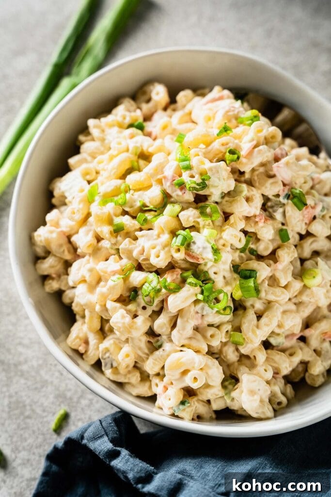Classic Hawaiian Macaroni Salad Recipe for Tropical Gatherings 7 macaroni salad in a bowl vertical