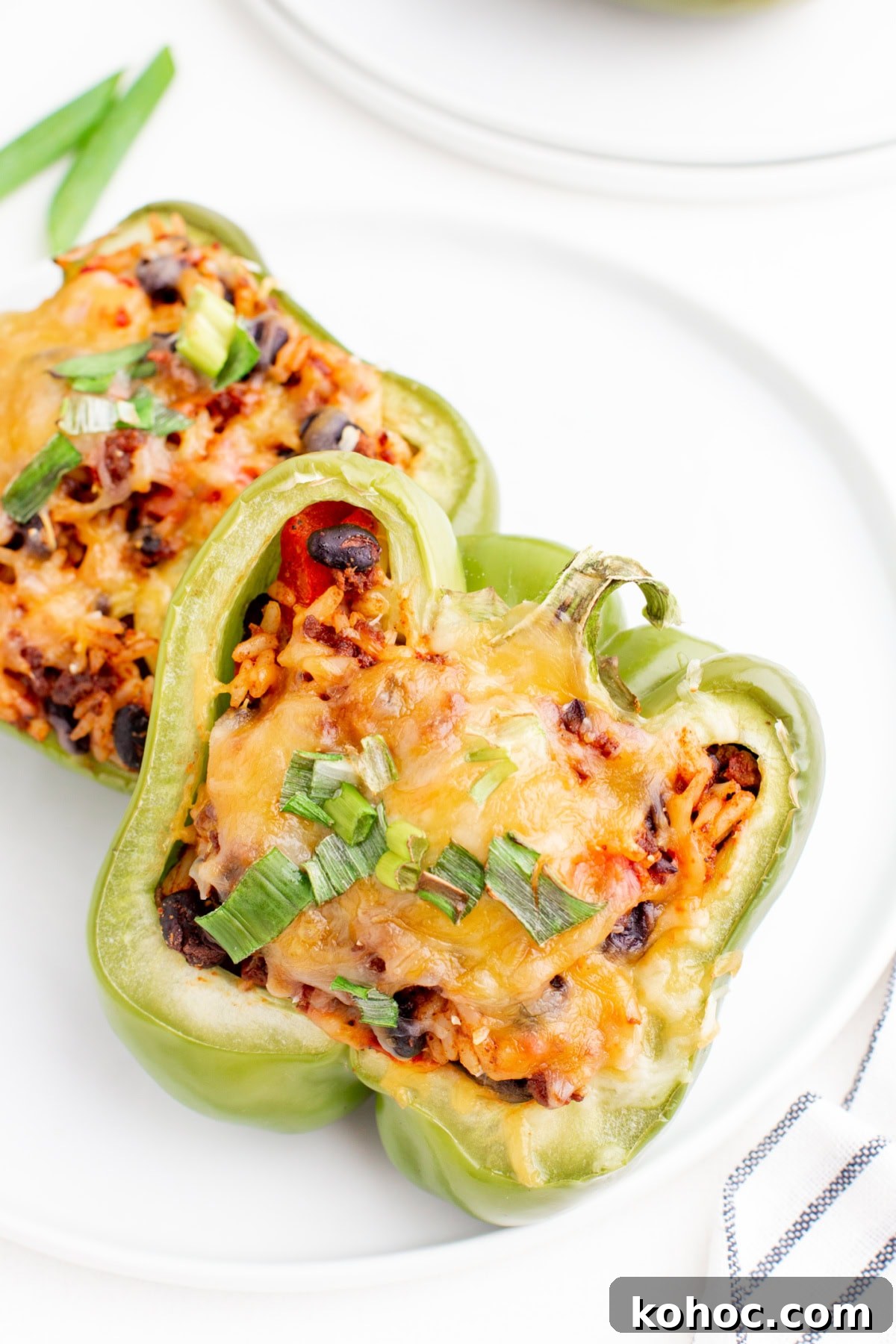 serving of taco stuffed peppers on a plate