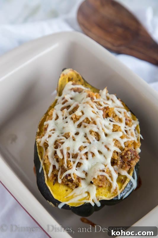 Quinoa and Sausage Stuffed Acorn Squash Recipe 4 Quinoa and Sausage Stuffed Acorn Squash - Sweet acorn squash stuffed with spicy Italian sausage, quinoa, sweet dried cranberries and walnuts. A perfect fall dinner that can be even be made ahead of time!