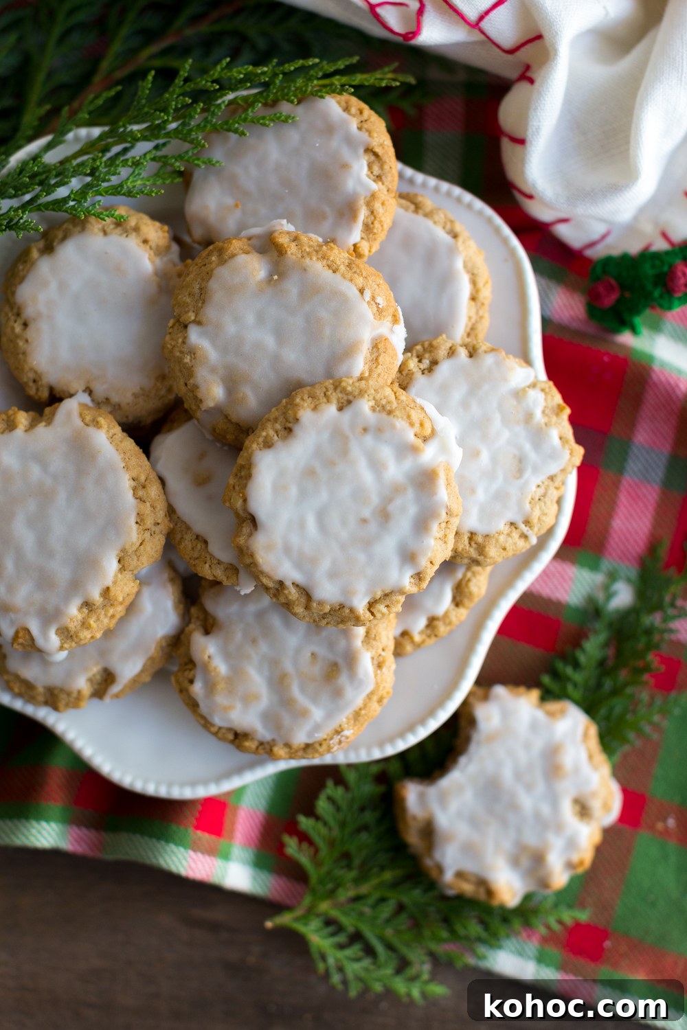 Chinese Five-Spice Iced Oatmeal Cookies Recipe 14 Cluttered plate of Chinese Five Spice Iced Oatmeal Cookies - overhead shot with christmas decor