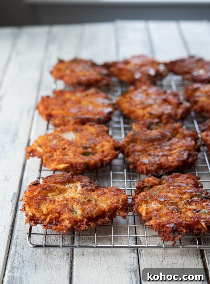 Cheesy Kimchi Potato Pancakes Recipe for Crispy, Flavorful Korean-Style Pancakes 11 Cheesy Kimchi Potato Pancakes on a cooling rack.
