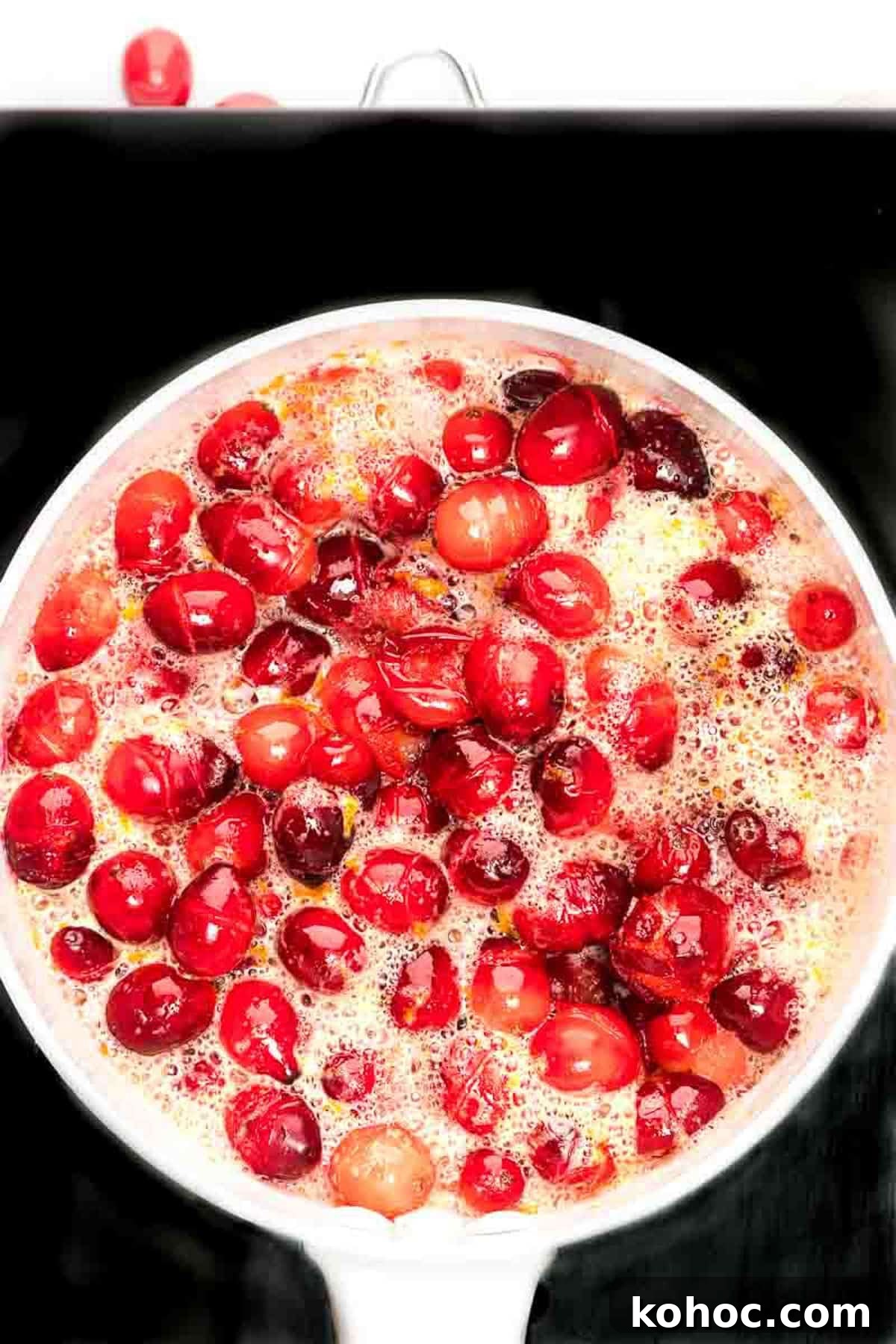 Overhead view of cranberries cooking down