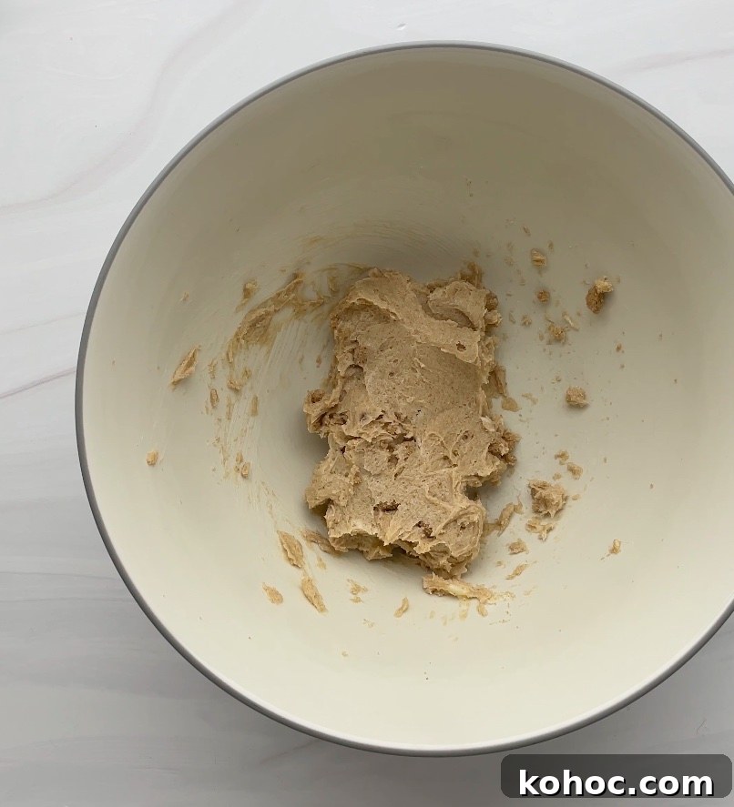 Crispy Gluten-Free Gingersnap Cookies You’ll Love 6 Creamed butter and sugar in a bowl.