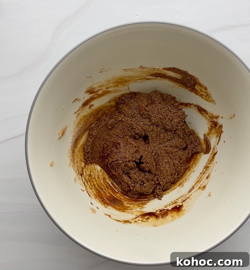 Crispy Gluten-Free Gingersnap Cookies You’ll Love 7 Wet ingredients in a bowl.