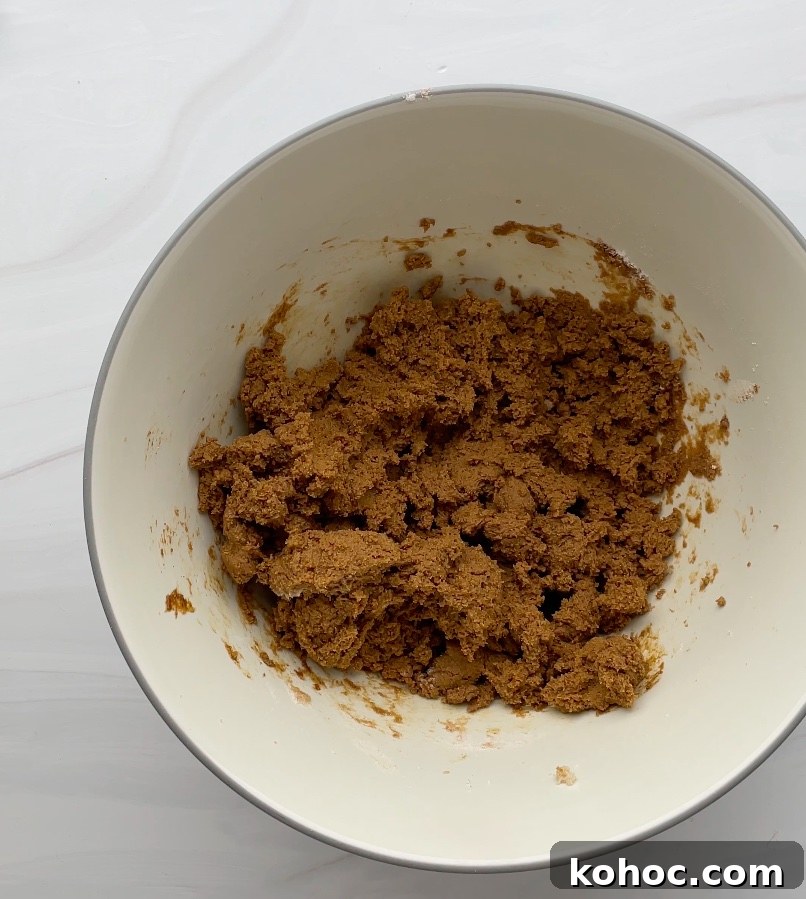 Crispy Gluten-Free Gingersnap Cookies You’ll Love 8 Cookie dough in a bowl.