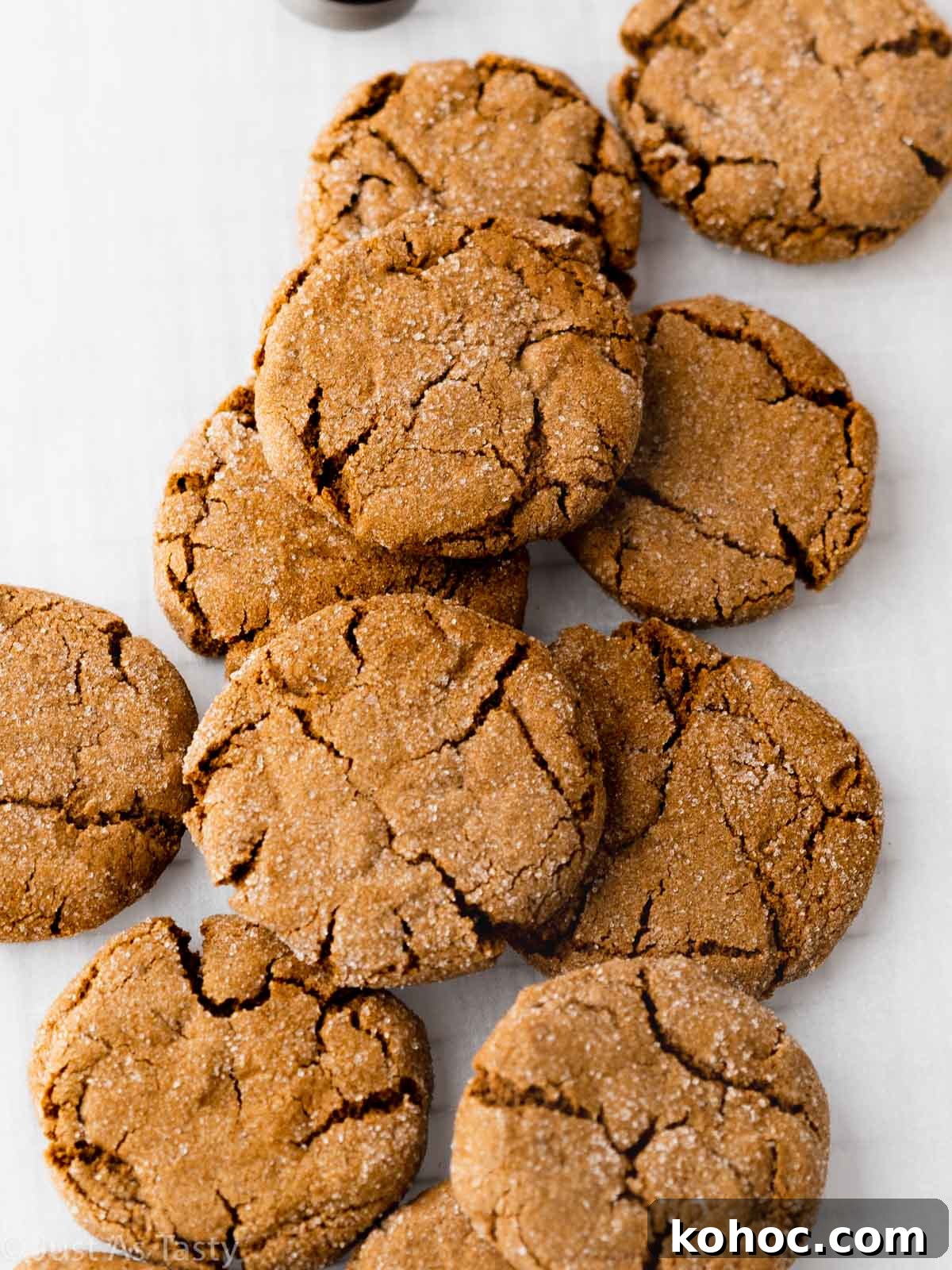 Crispy Gluten-Free Gingersnap Cookies You’ll Love 10 Gluten free gingersnaps on parchment paper.