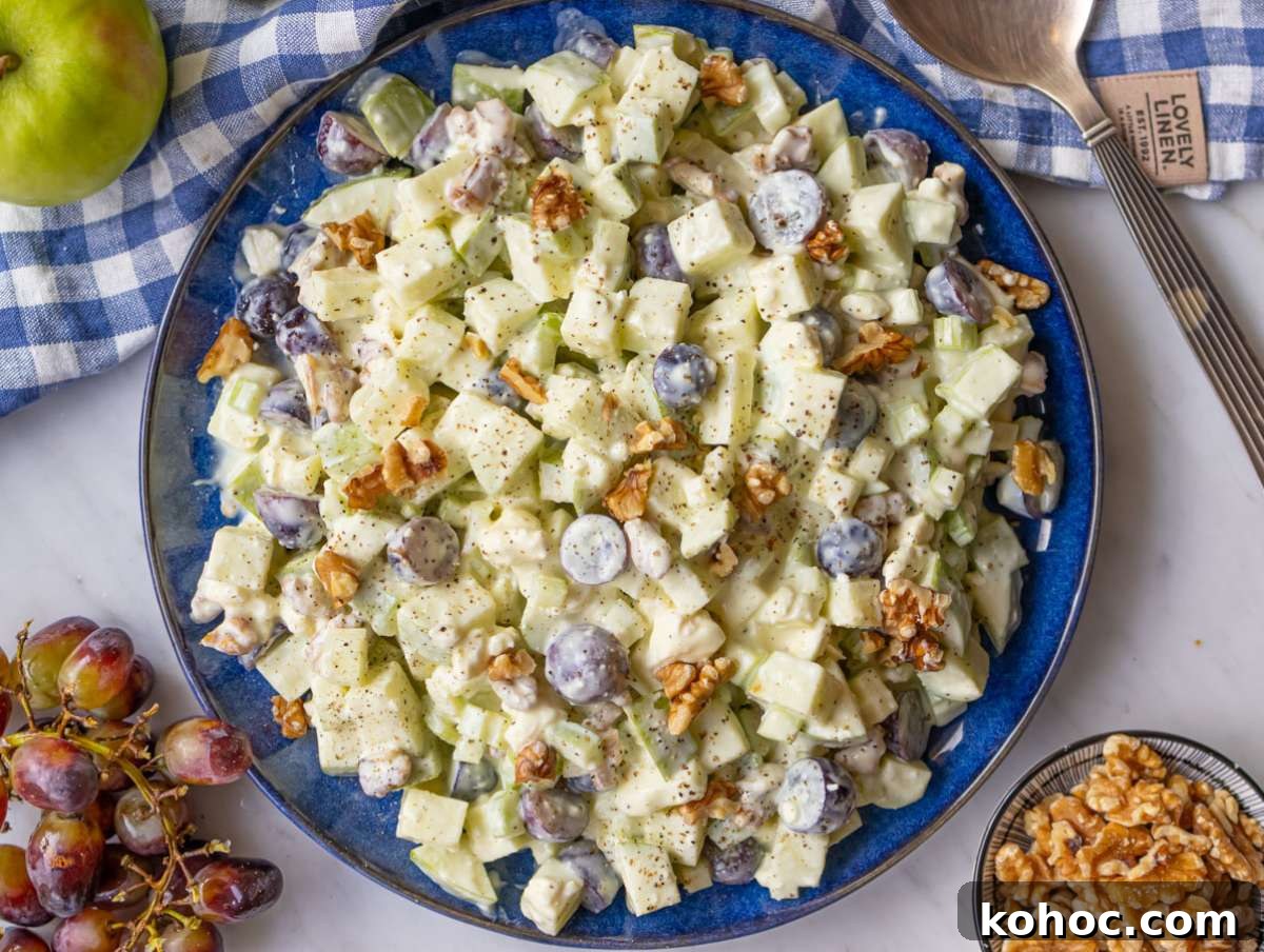 Waldorf Salad with Greek Yogurt Dressing — Light Apple & Walnut Salad 7 Step 3 Healthy Waldorf salad with Greek yogurt dressing served on a platter.