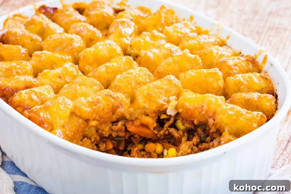 29 Tasty Meals You Can Make with Frozen Vegetables 18 Cheesy frozen mixed vegetables tater tot casserole in a white dish.