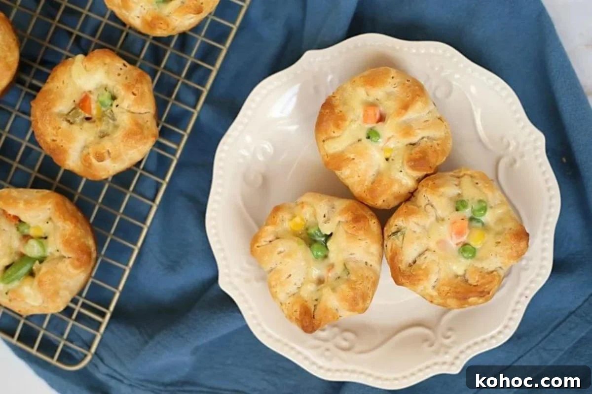 29 Tasty Meals You Can Make with Frozen Vegetables 19 Freshly baked rotisserie chicken and vegetable muffins on a white ornate plate.