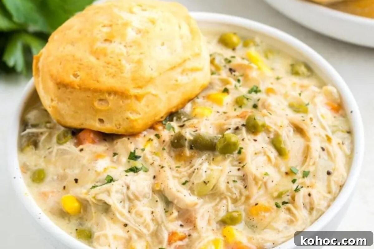 29 Tasty Meals You Can Make with Frozen Vegetables 30 A bowl of soup made using frozen vegetables, with a biscuit on top.