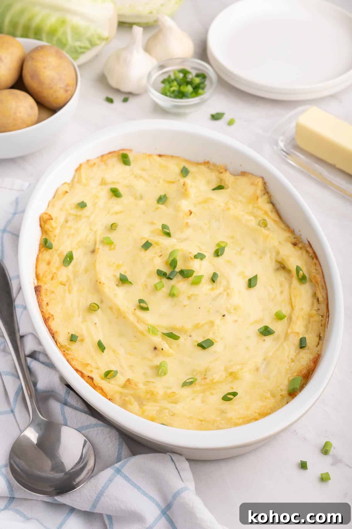 How to Cook Authentic Irish Potatoes: Classic Recipes & Tips 2 Irish potatoes in a white casserole dish.