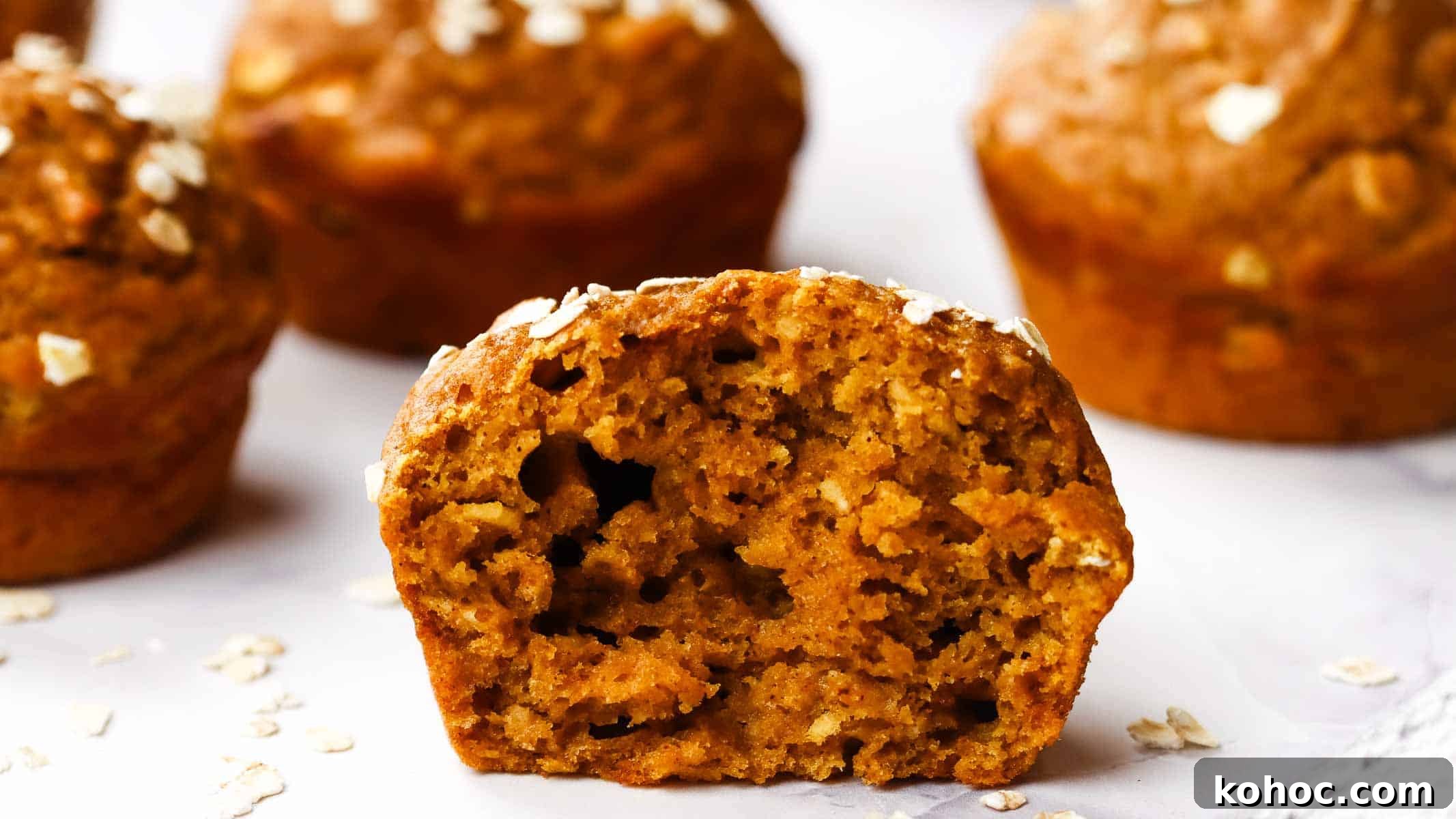 Moist Pumpkin Oatmeal Muffins with Warm Spices 3 a half cut pumpkin oatmeal muffin
