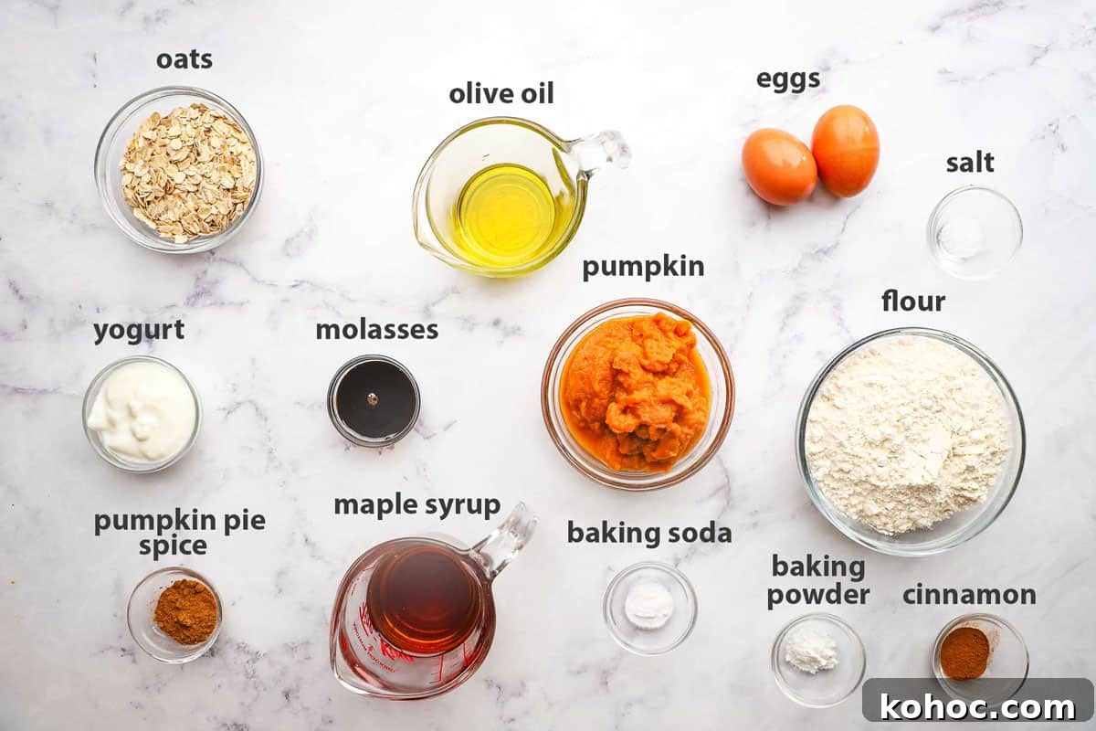 Moist Pumpkin Oatmeal Muffins with Warm Spices 4 ingredients pictured and labelled for pumpkin oatmeal muffins