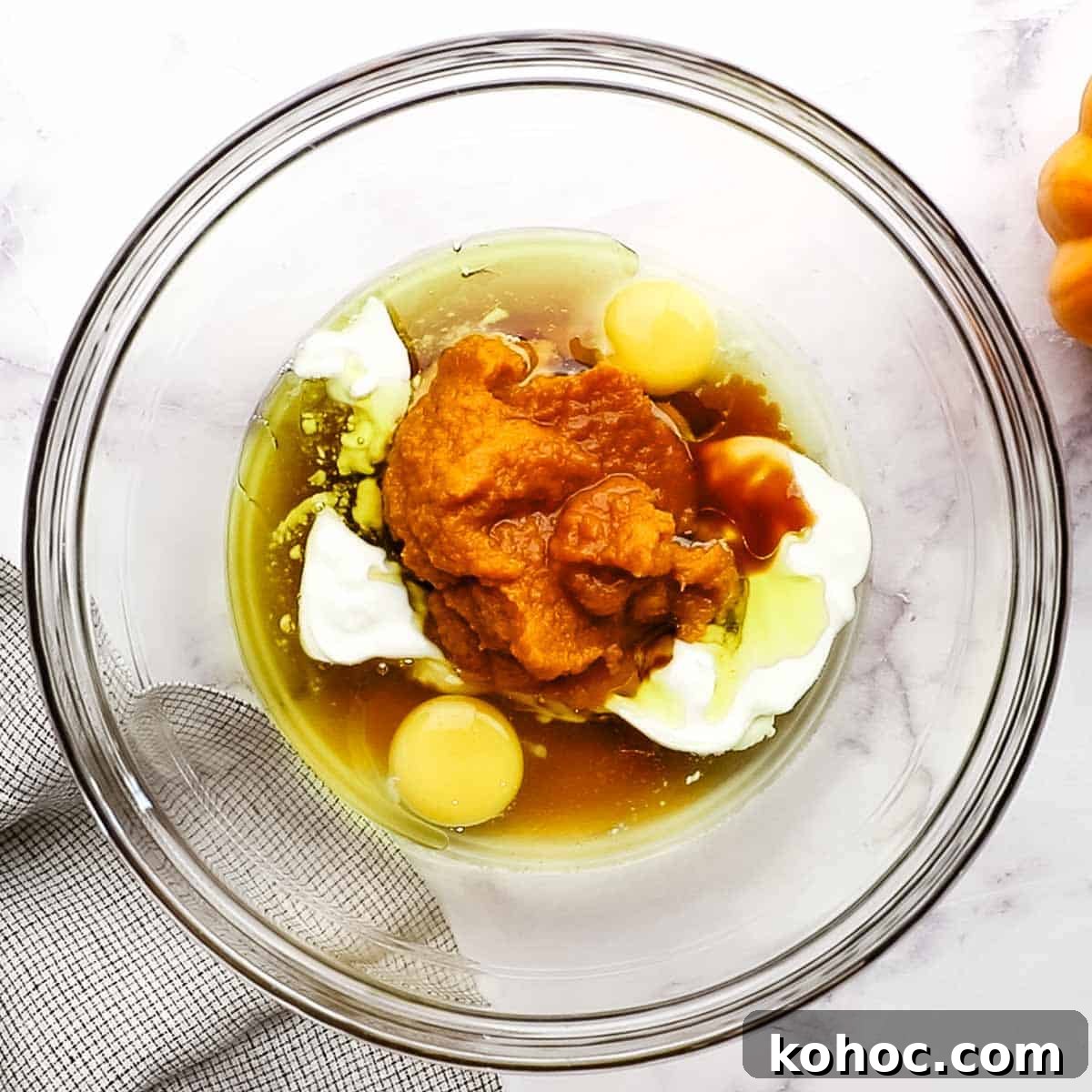 Moist Pumpkin Oatmeal Muffins with Warm Spices 5 wet ingredients in a big bowl