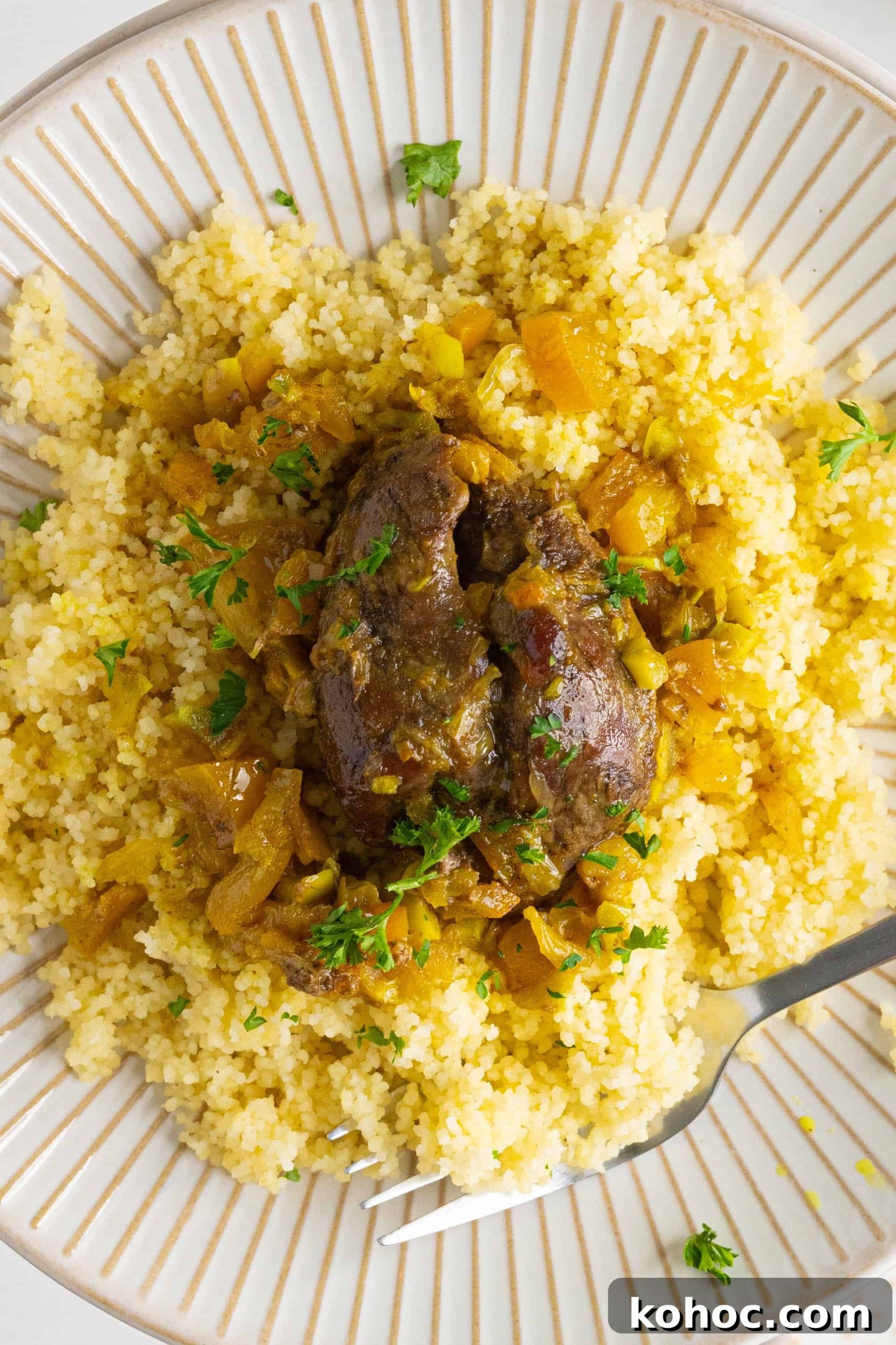 Moroccan Lamb Shank Tangia: Traditional Slow-Cooked Tagine Recipe 2 a plate of Moroccan lamb shank tagine
