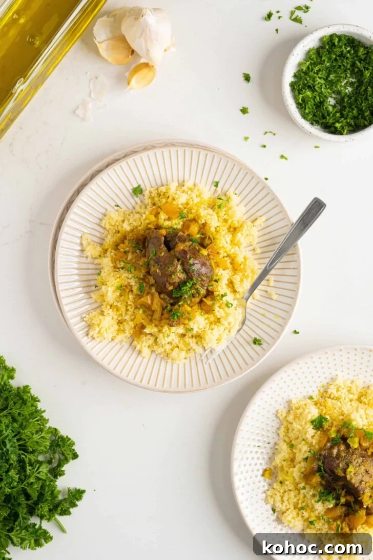 Moroccan Lamb Shank Tangia: Traditional Slow-Cooked Tagine Recipe 7 a plate of Moroccan lamb shank tagine