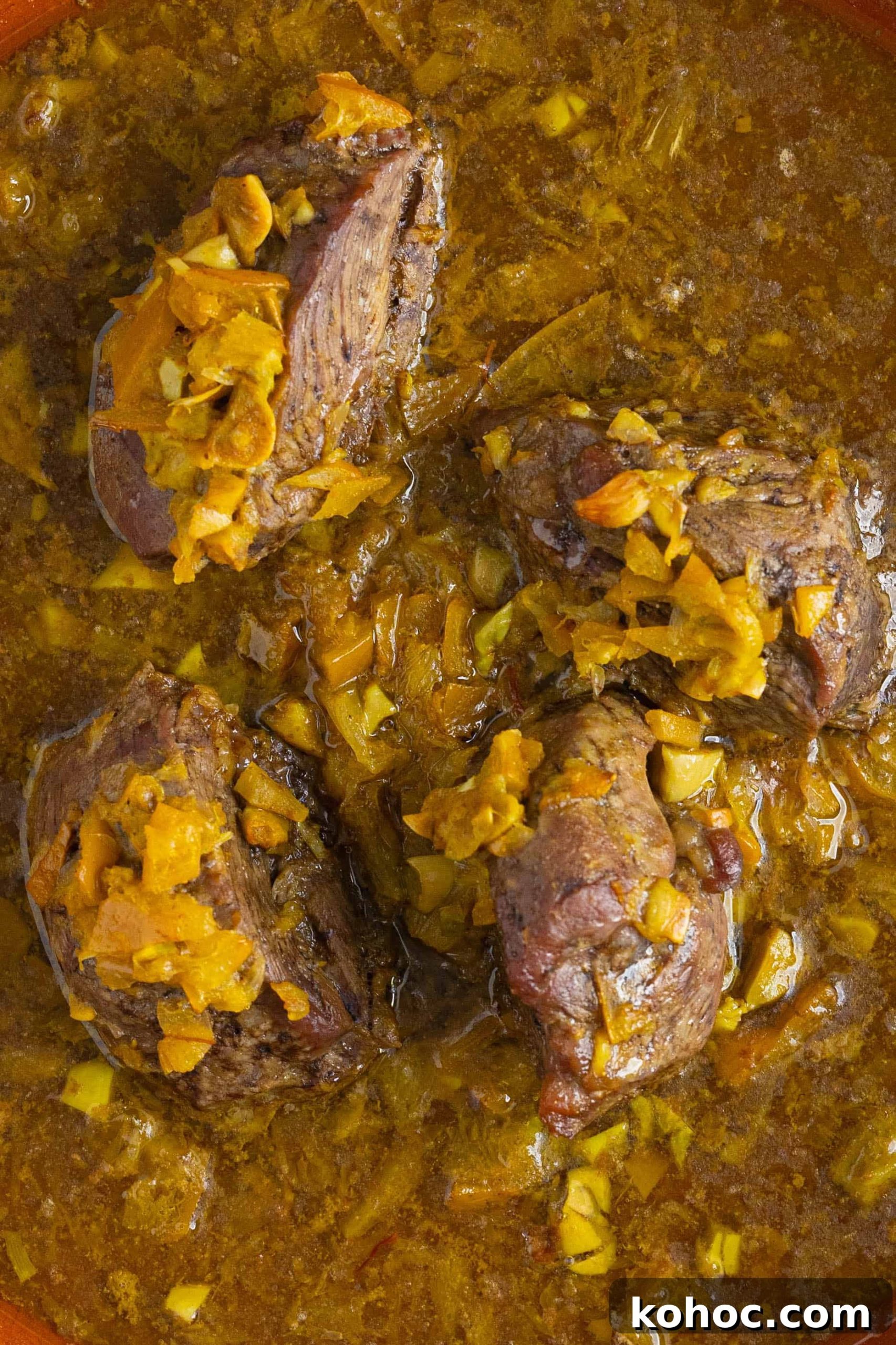Moroccan Lamb Shank Tangia: Traditional Slow-Cooked Tagine Recipe 8 lamb shanks in a Moroccan sauce