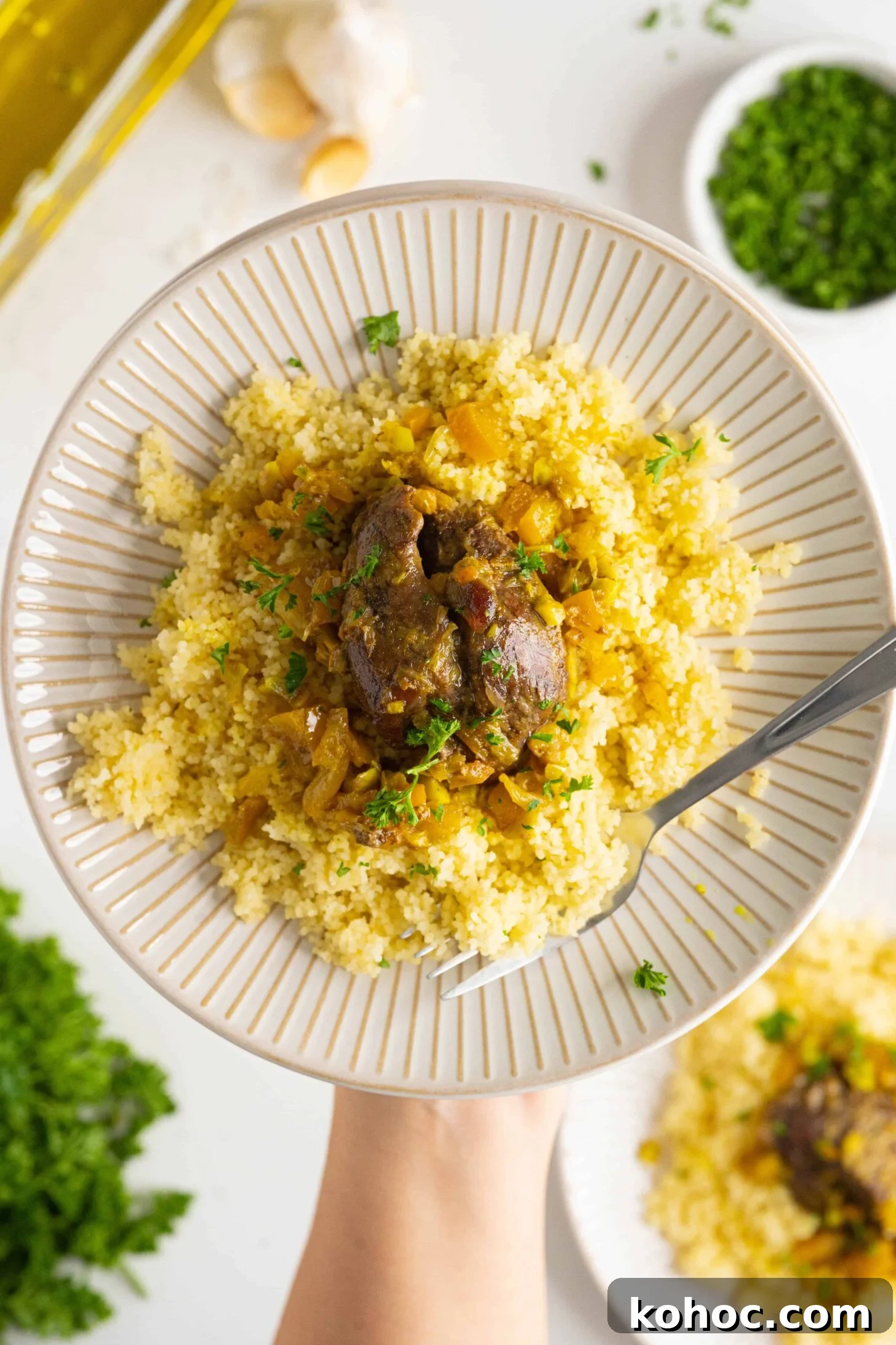 Moroccan Lamb Shank Tangia: Traditional Slow-Cooked Tagine Recipe 9 a plate of Moroccan lamb shank tagine