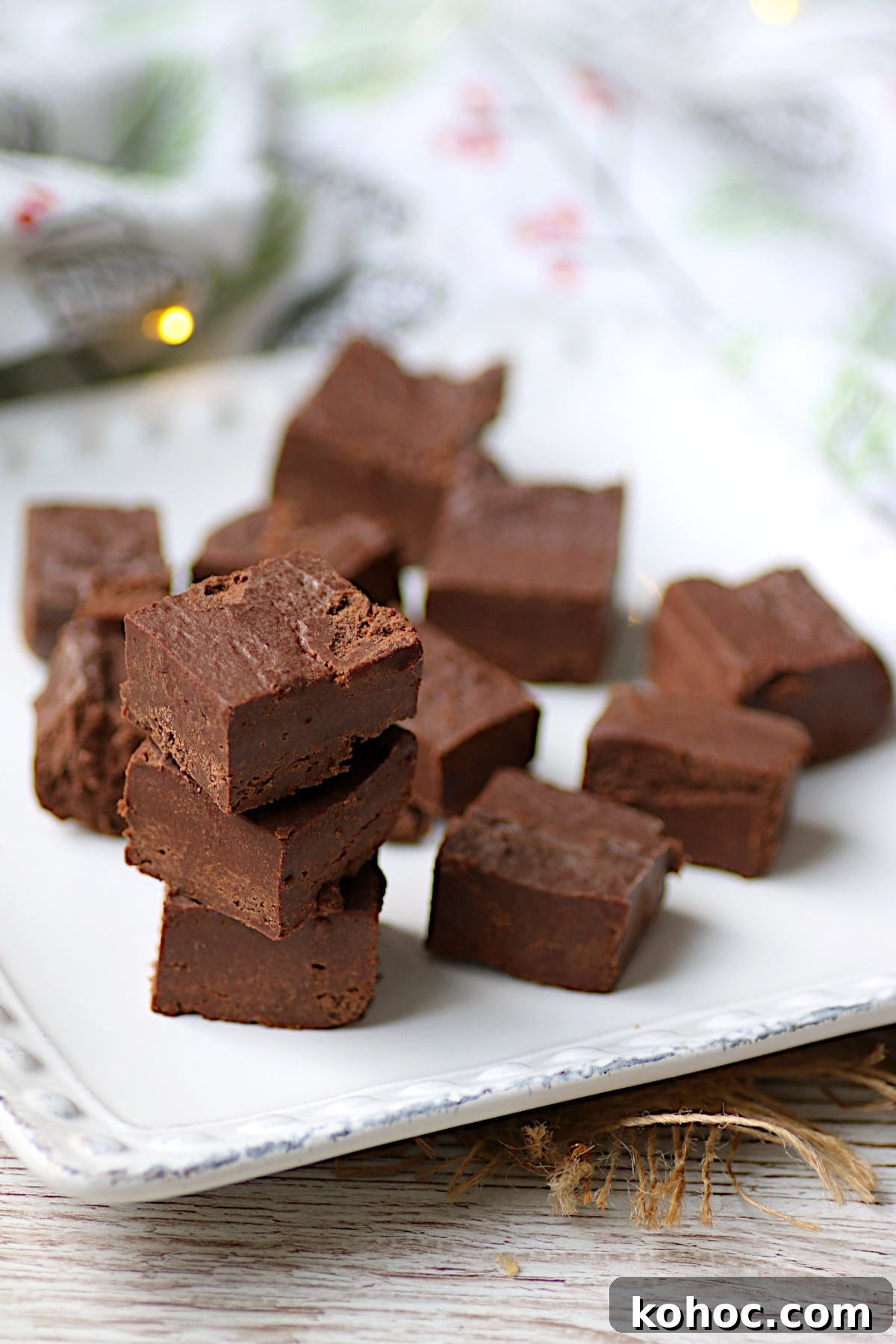 Homemade Frango Mint Chocolates: Chocolate Mint Melts Recipe 3 Copycat Frango Mints on a white plate.