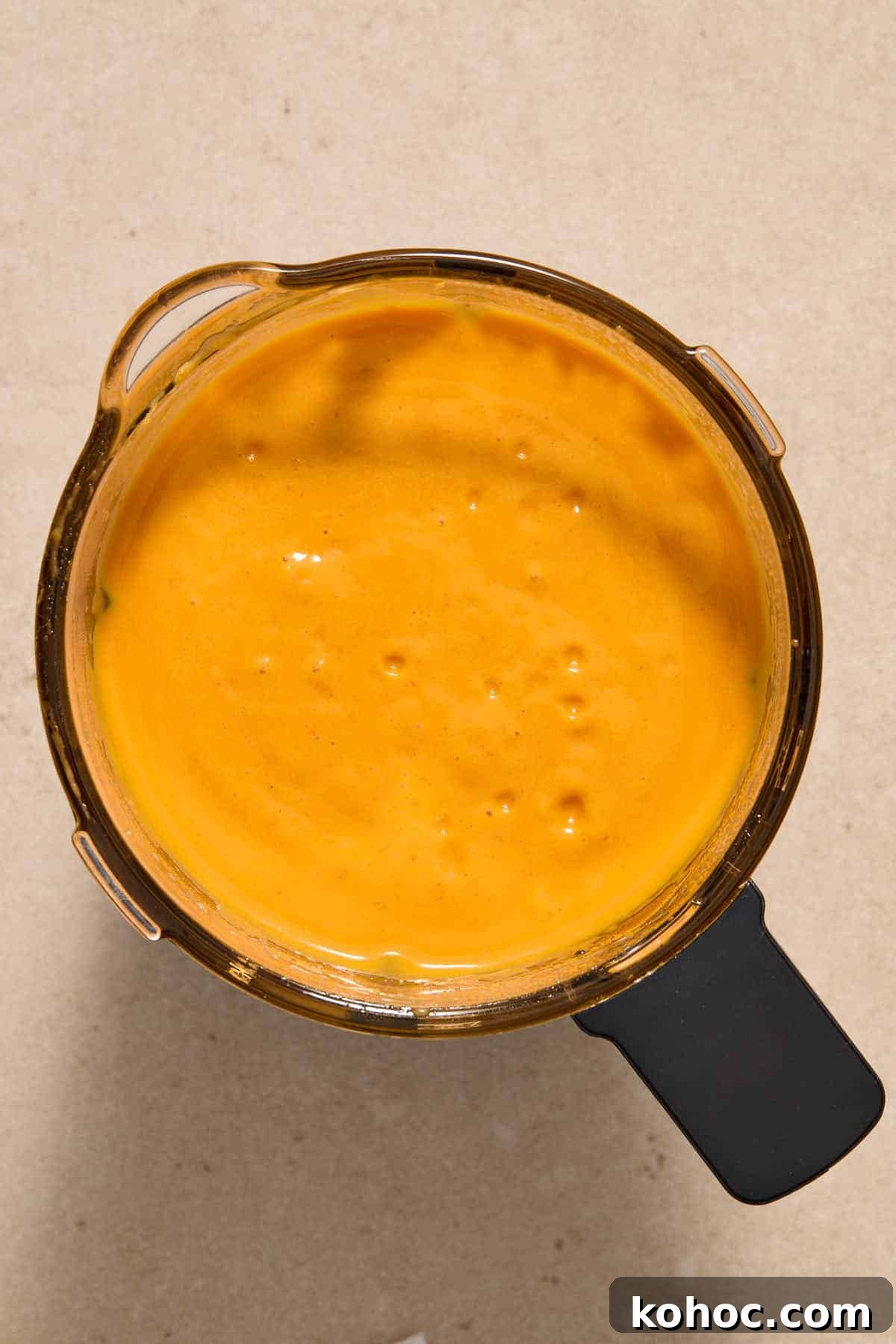 Roasted Red Pepper & Butternut Squash Soup — Dairy-Free Vegan Recipe 8 Overhead view of blended soup in blender.