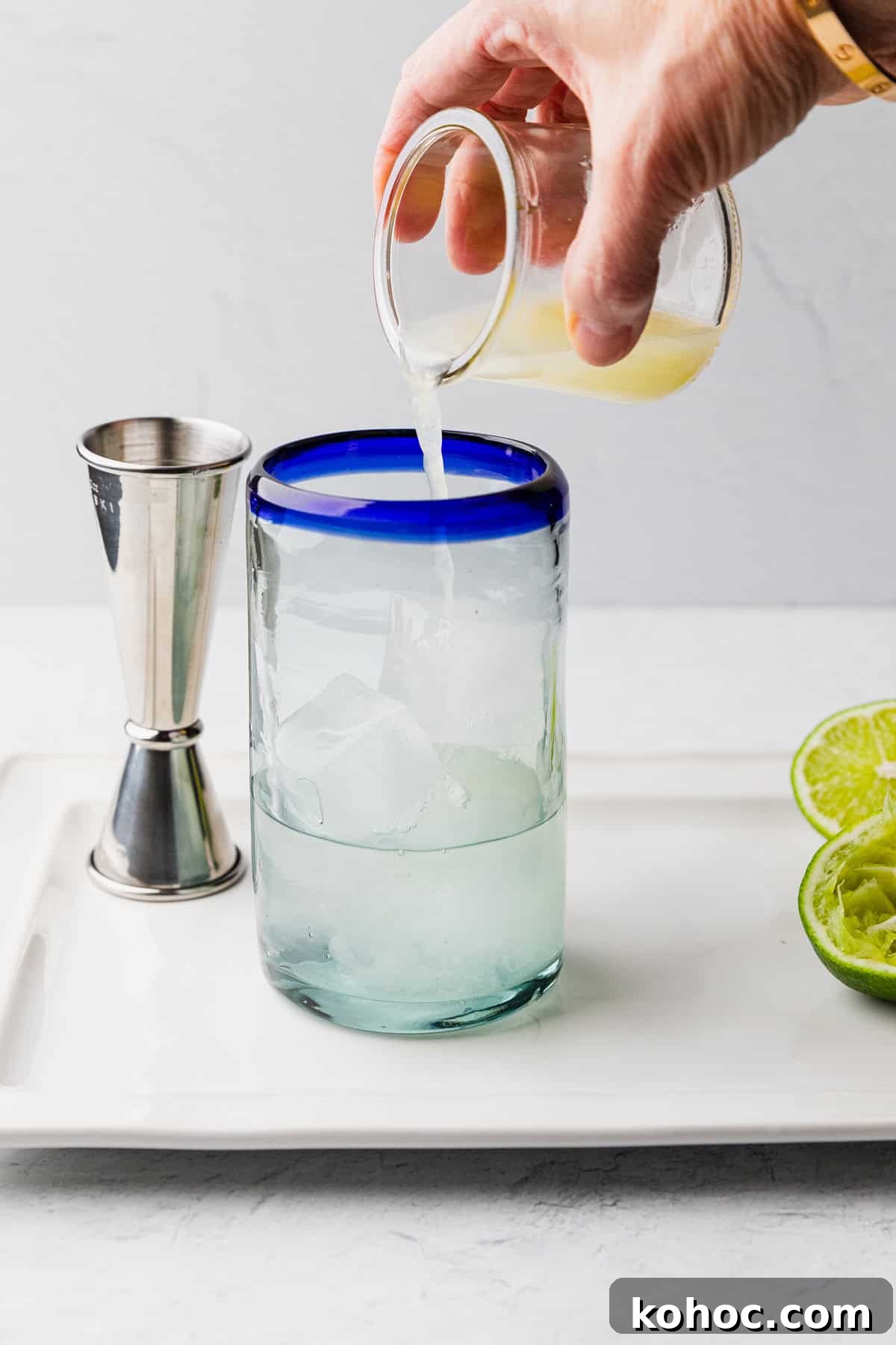 How to Make a Classic Texas Ranch Water Cocktail 6 Pour lime into glass.