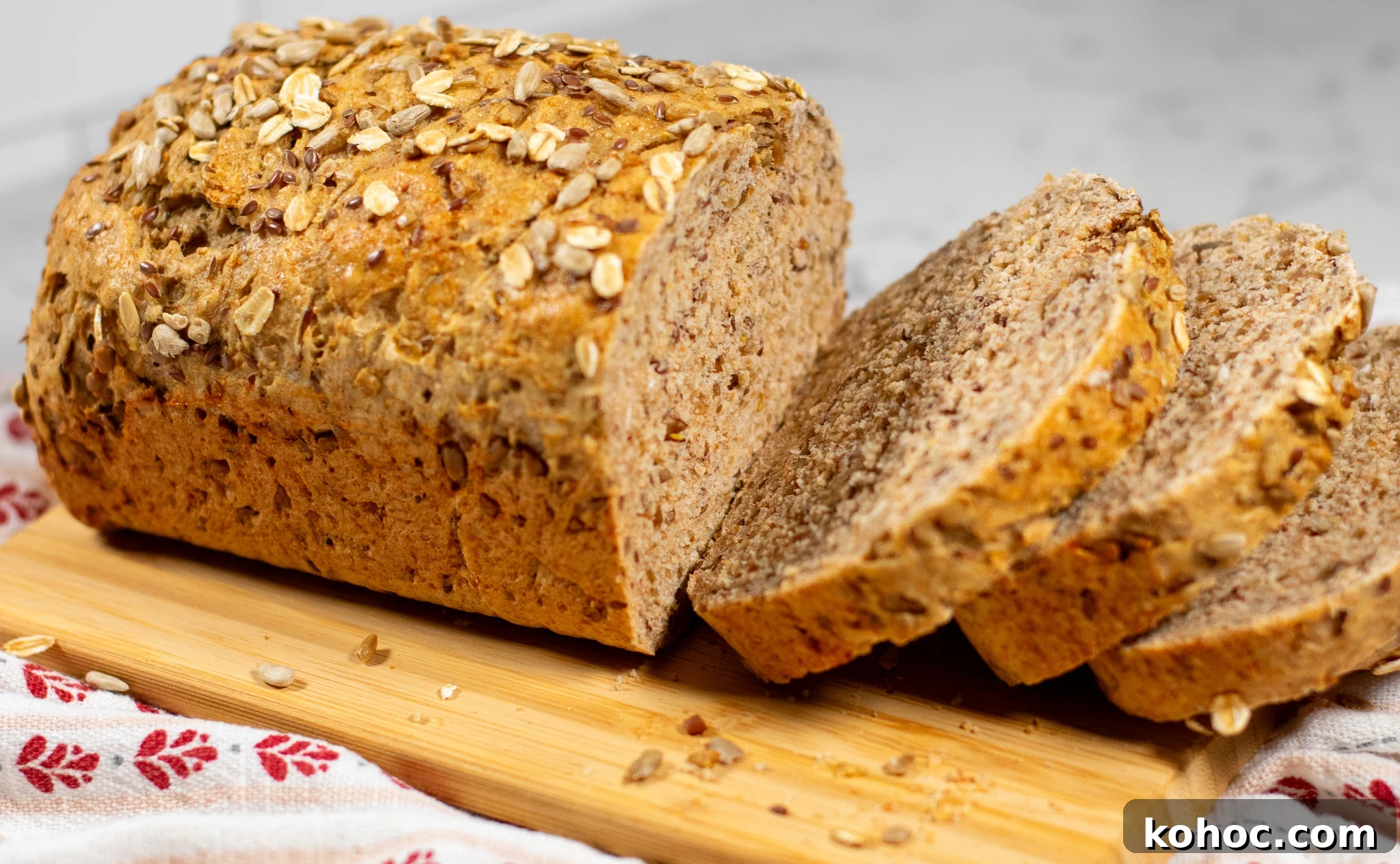 Whole Grain Loaf Recipe: Rustic Nordic Grovbrød Guide 11 Slices of whole grain bread on a cutting board.