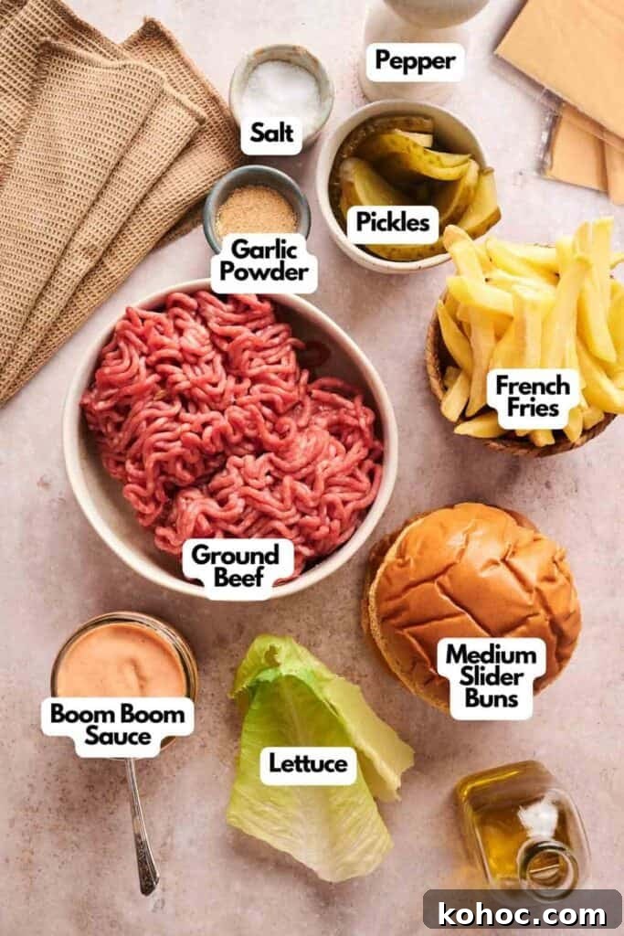 Savvy Slider Copycat Recipe: How to Make Restaurant-Style Sliders 3 Ingredients for Copycat Savvy Slider sliders laid out on a table, including ground beef, slider buns, lettuce, french fries, pickles, boom boom sauce, garlic powder, salt, and pepper.