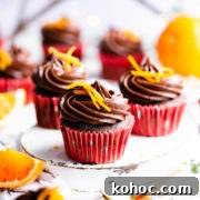 Chocolate Orange Cupcakes Recipe with Zesty Ganache 13 straight ahead super close up at a festive cupcake topped with orange peel