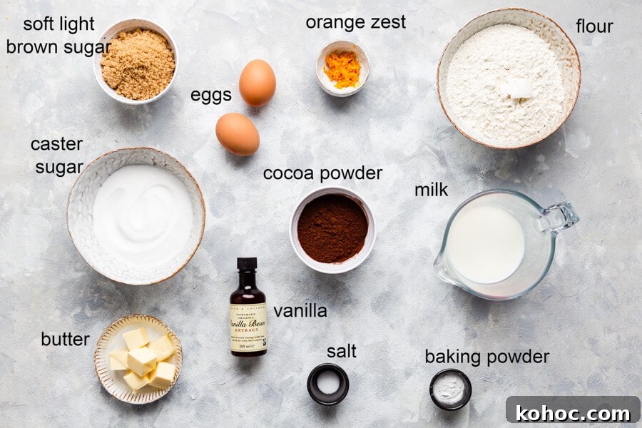 Chocolate Orange Cupcakes Recipe with Zesty Ganache 3 overhead view of the ingredients for chocolate orange cupcakes with labels