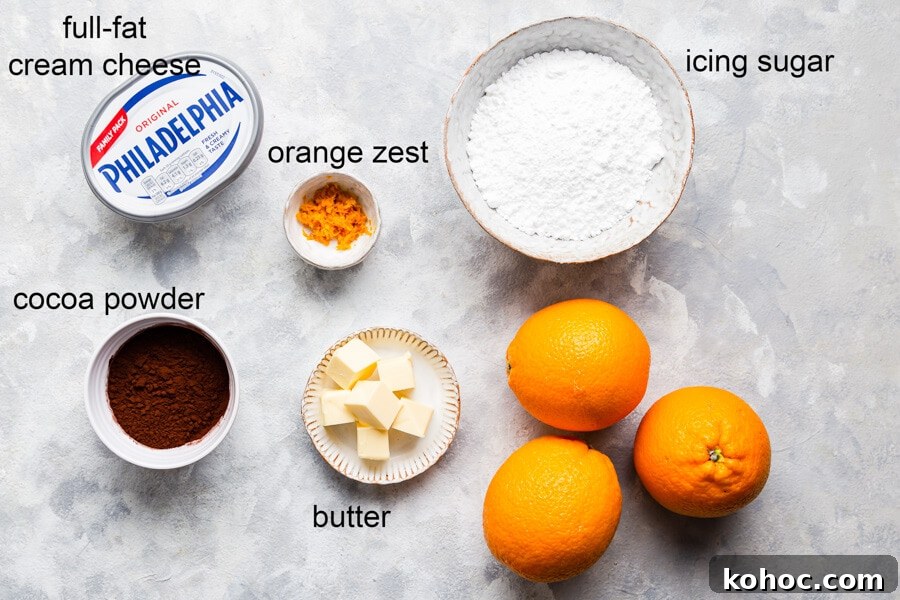 Chocolate Orange Cupcakes Recipe with Zesty Ganache 4 overhead view of the ingredients for buttercream with labels