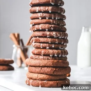 Chewy Pumpkin Snap Cookies Recipe — Soft Spiced Fall Treat 9 A stack of chewy pumpkin snap cookies.