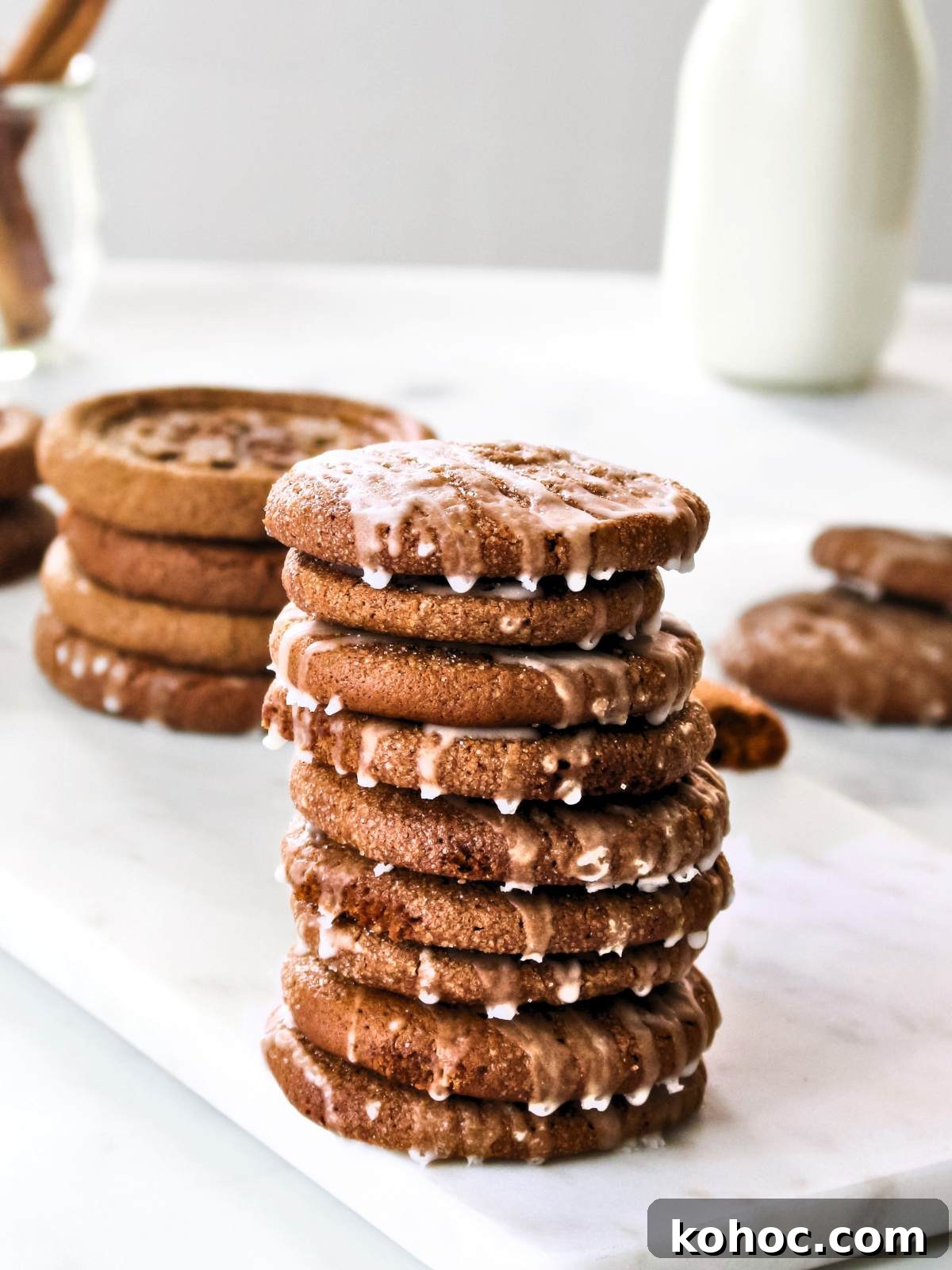 Chewy Pumpkin Snap Cookies Recipe — Soft Spiced Fall Treat 7 Chewy pumpkin snap cookies stacked up on a table