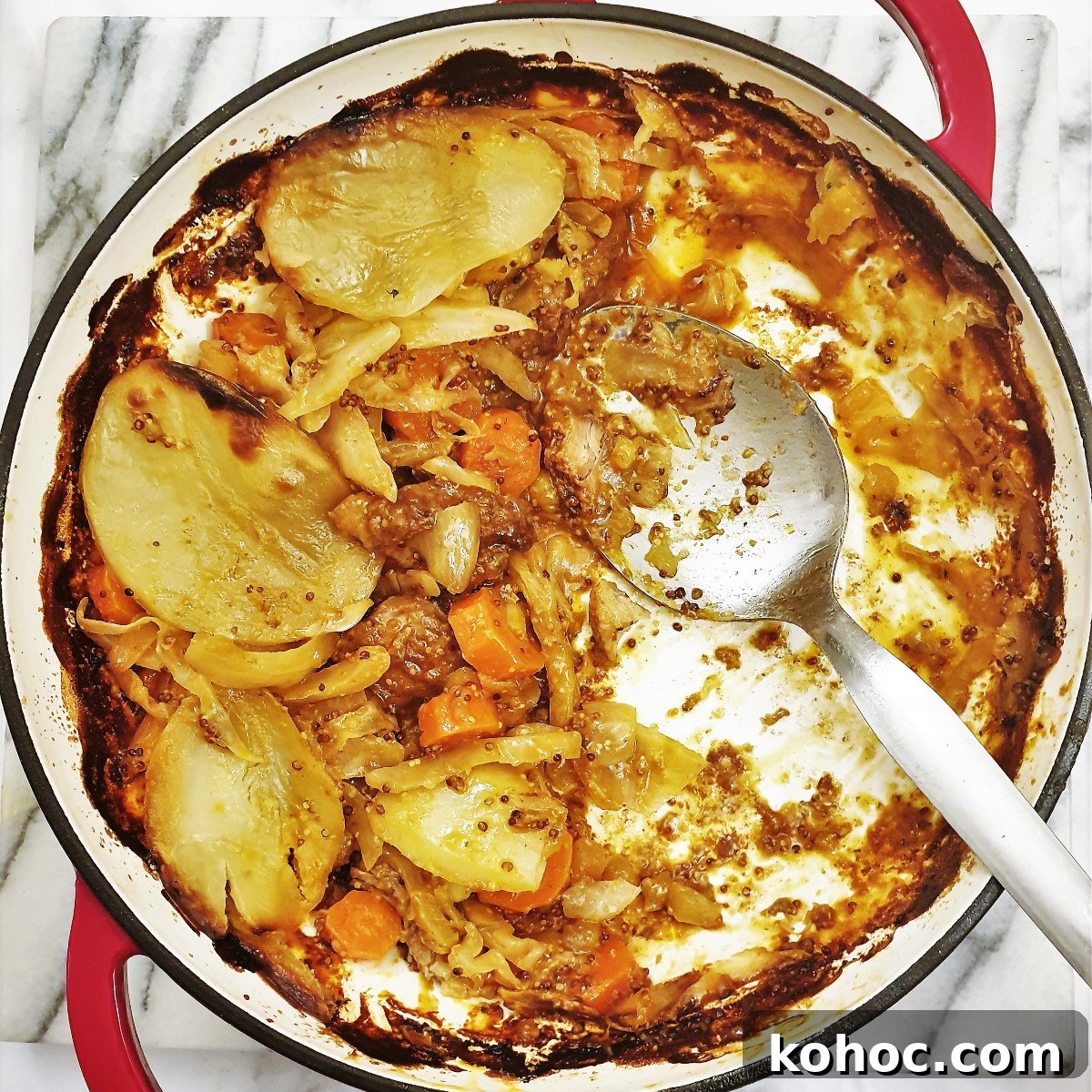 Savory Pork and Cabbage Hotpot Recipe for Cozy Weeknights 6 An almost empty serving dish of pork and cabbage hotpot.
