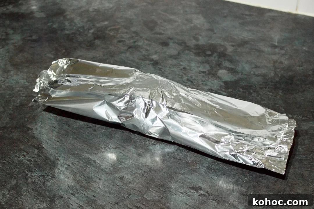 Slow Cooker Baked Jacket Potatoes Recipe 14 a jacket potato wrapped in tin foil