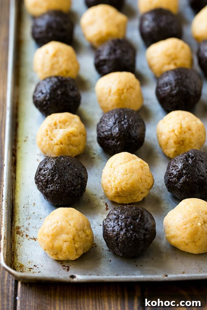 Oreo ball centers Oreo ball centers made from vanilla and chocolate Oreos on a sheet pan.