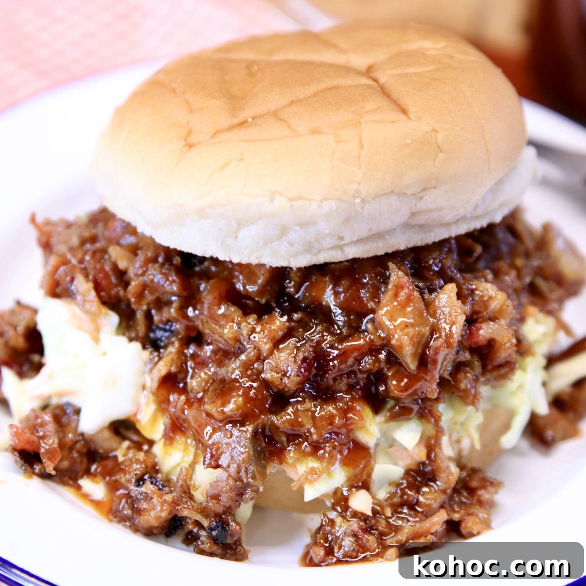 Slow-Cooker Pulled Pork Casserole with Cheesy Topping 12 chopped bbq sandwich with slaw.