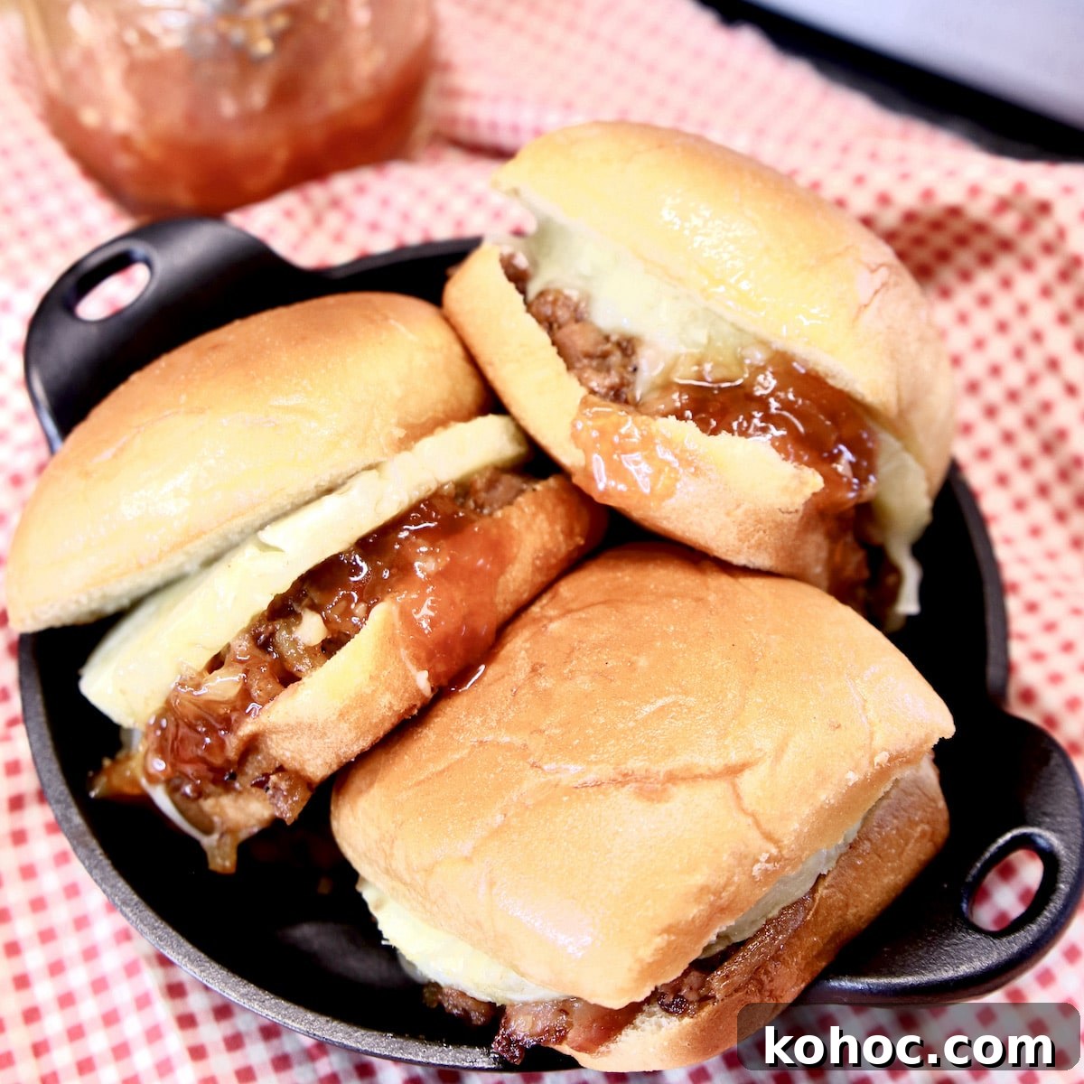 Slow-Cooker Pulled Pork Casserole with Cheesy Topping 13 3 pineapple pulled pork sliders in a mini cast iron pan.