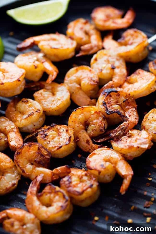 Grilled Spicy Lime Shrimp on a grill.