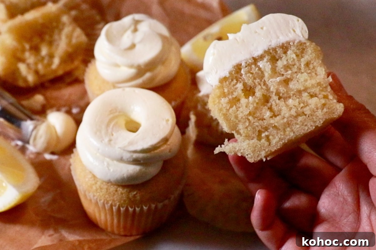 Zesty Lemon Cupcakes Recipe with Creamy Lemon Frosting 4 fluffy lemon cupcakes frosted with tangy lemon buttercream