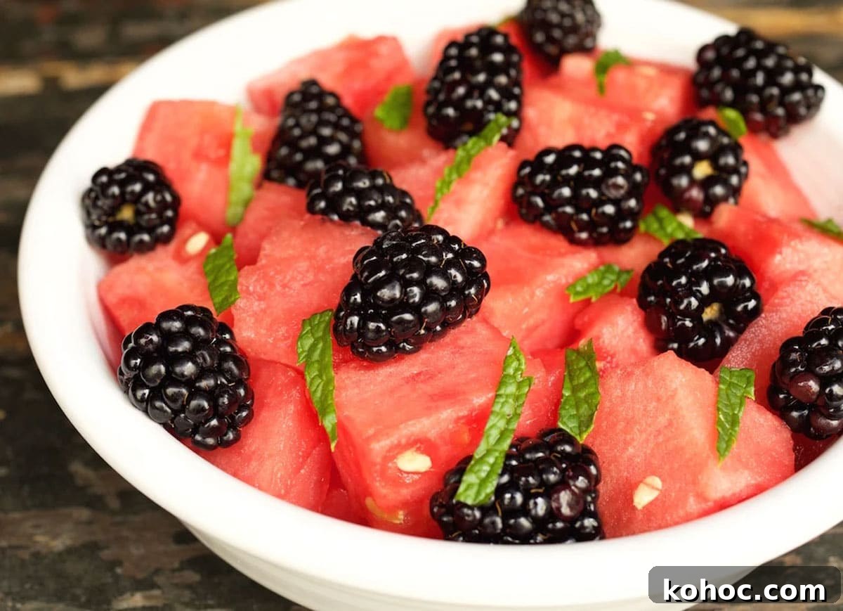 22 Memorial Day Recipes for the Ultimate Backyard BBQ 17 Watermelon and blackberry fruit salad in a bowl.