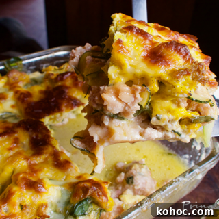 Low-Carb Breakfast Lasagna with Veggies and Cheese 3 Breakfast lasagna being served at the table.