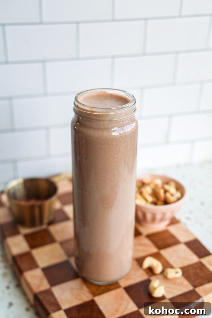 Ultra-Creamy Chocolate Cashew Milk Recipe 4 A jar of creamy dairy-free chocolate milk.