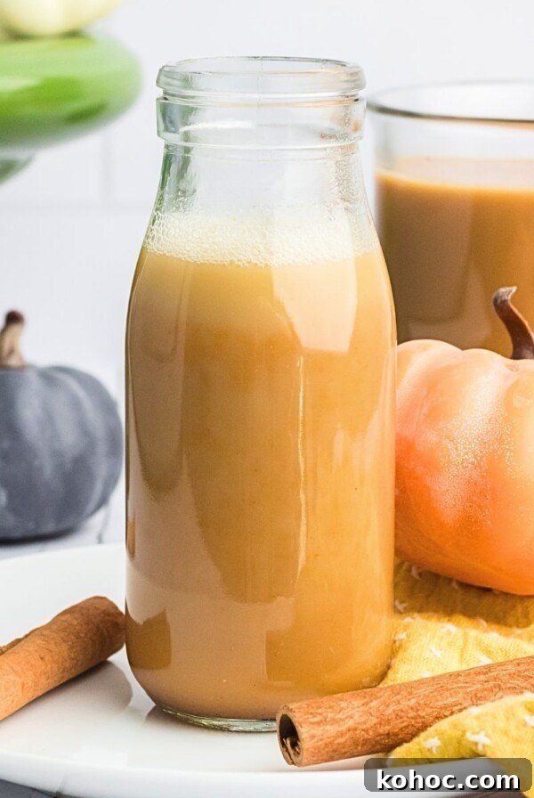 Green Tea Shot Recipe: How to Make the Classic Cocktail 10 Creamy pumpkin spice creamer in a clear glass bottle with small pumpkins around it.