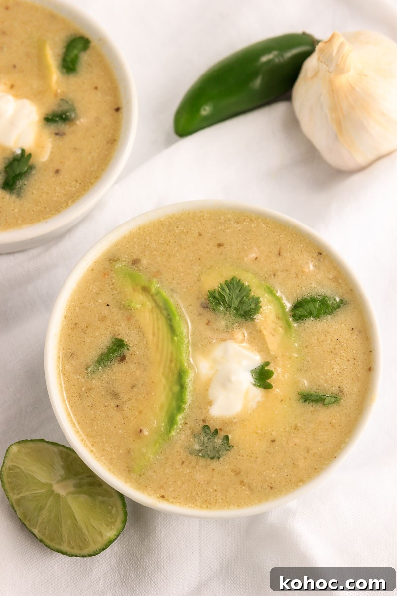 Two bowls of Instant Pot Creamy Chile Verde Chicken Soup