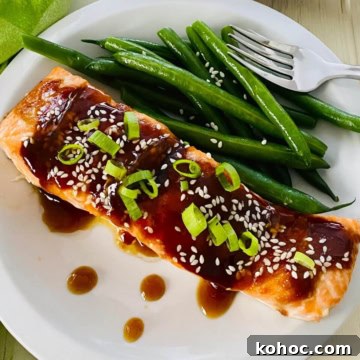plated teriyaki salmon with green beans.