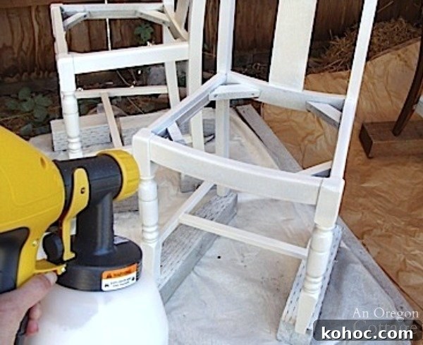 Pro Tips for Painting with an Affordable Handheld Paint Sprayer 3 Using Paint Sprayer on wood chair